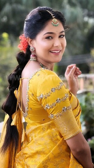 Mokshita looks so cute in a saree.