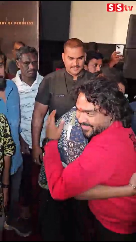 Arjun Janya falls at Shivanna's feet