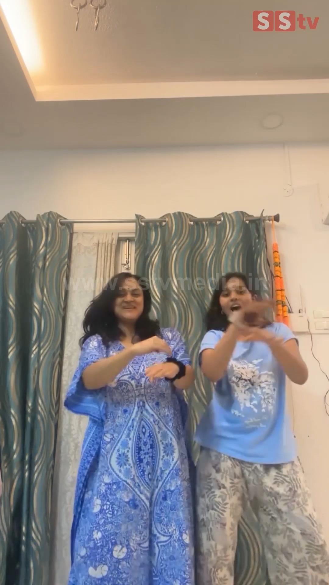 Actress Vinodini dances with her daughter