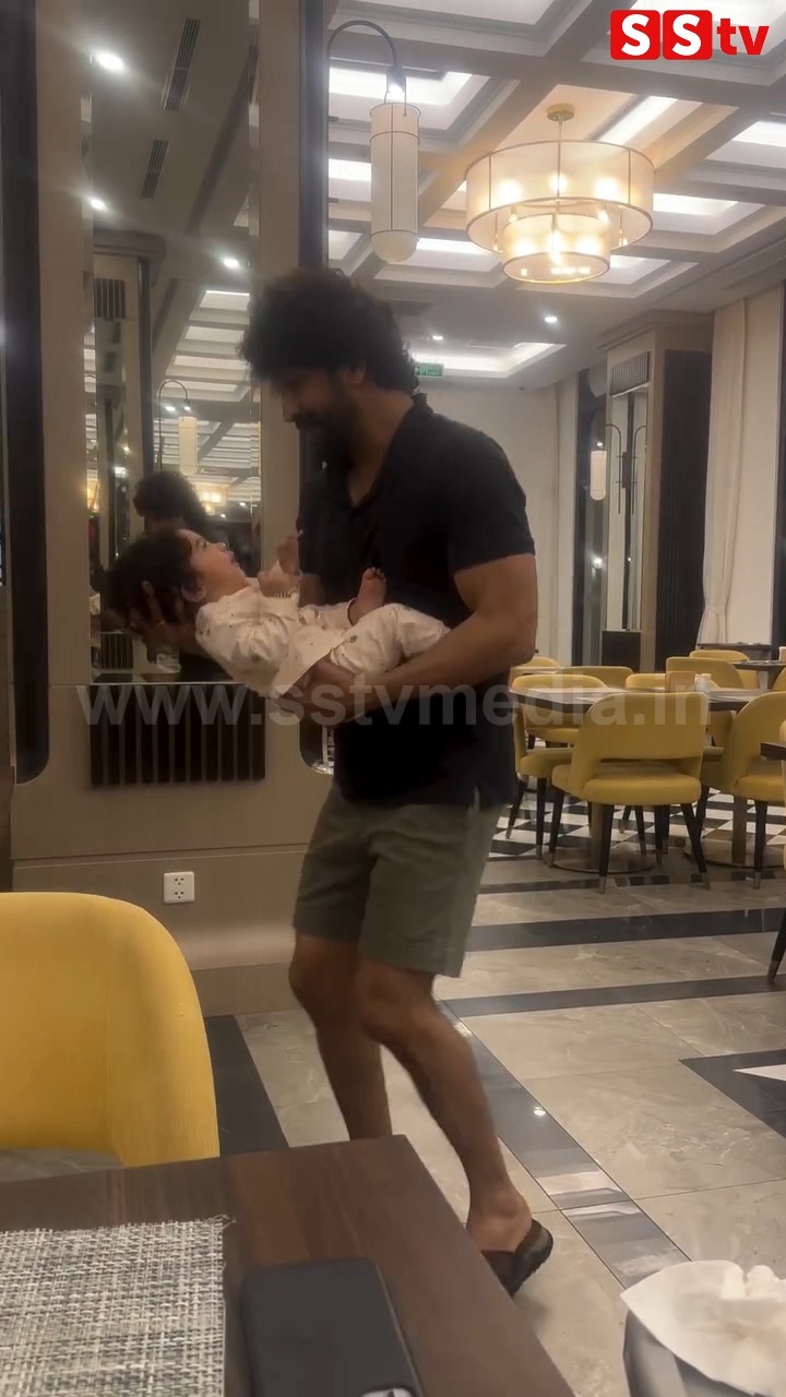 Actor Bhuvan dances while carrying a baby