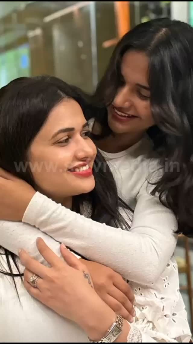 Pavithra Gowda hugs her daughter and takes a photo