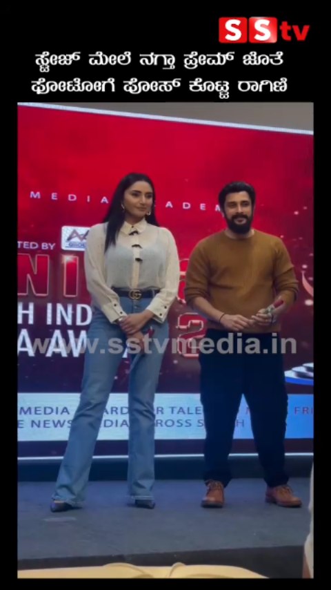 Ragini poses for a photo with Prem on stage