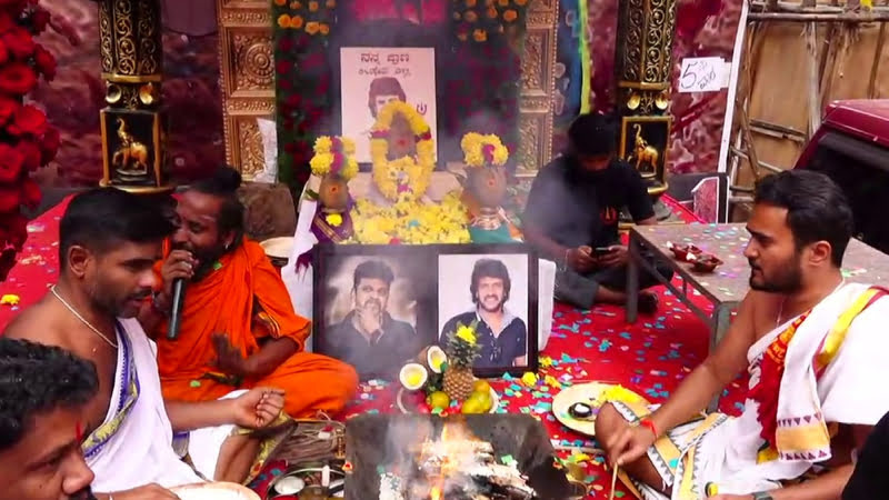 Pooja in front of theatre for Shivanna's healthy return