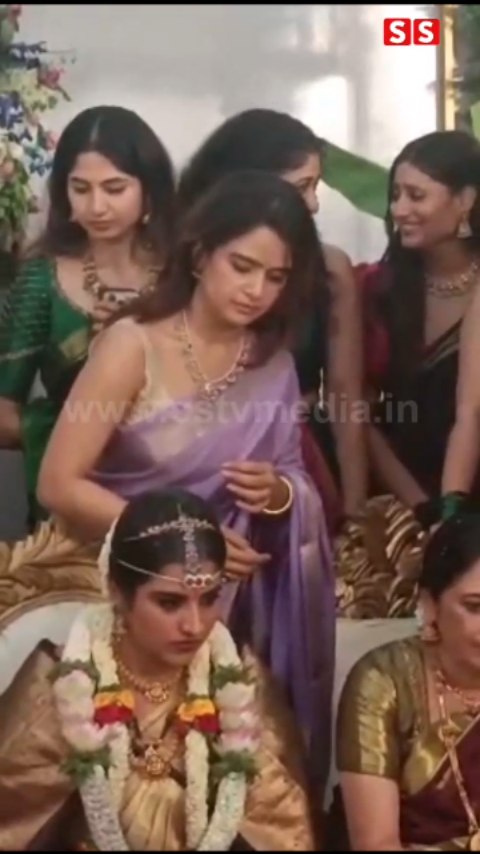 Look at the bride's face on Archana's face