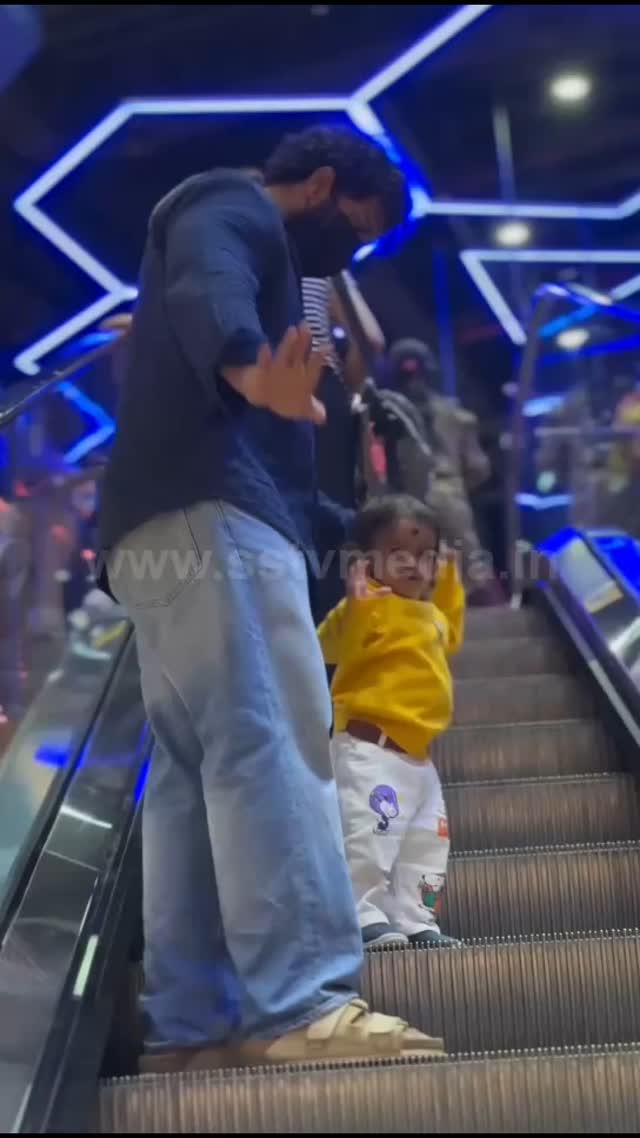 Karthik strolls around the mall with his younger sister's son