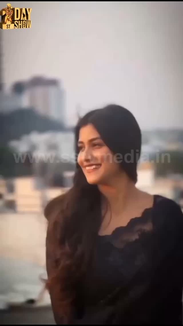 Gowthami shines in a black saree